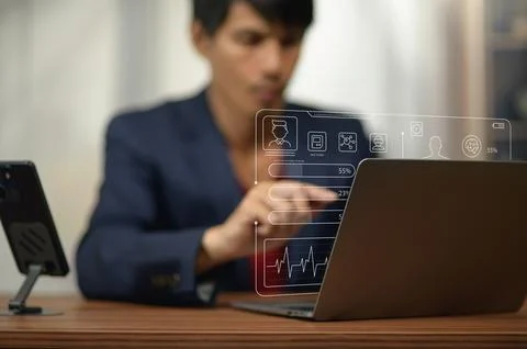 Businesswoman Analyzing Data and Using Digital Devices in Office Environment Stock Photos