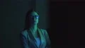 The businesswoman and a businessman standing near the screen 4k or 4k+ Resolution