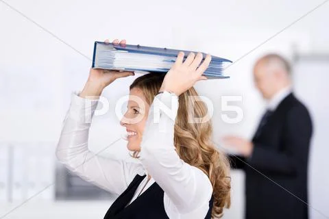 Businesswoman with a binder on her head Stock Photos