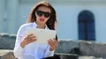 Businesswoman communicates via tablet computer HD Footage