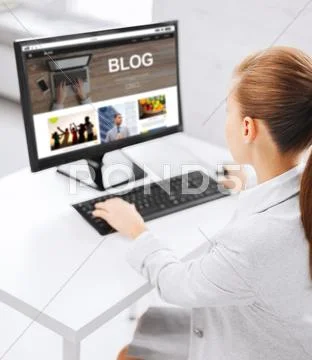 Businesswoman with computer blogging at office Stock Photos