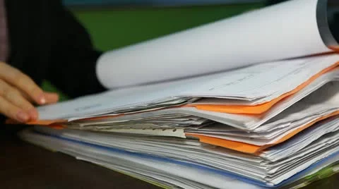 Businesswoman deeds at office verifying contract corporate document hand paper Stock Footage
