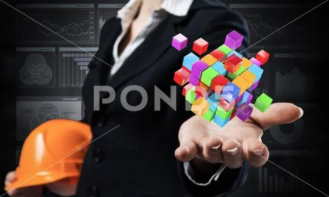 Businesswoman holds in palm abstract 3d cube Stock-Fotos