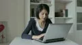 businesswoman at home with her laptop HD Footage
