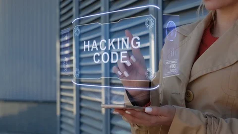 Businesswoman interacts HUD Hacking code Stock Footage 128786790