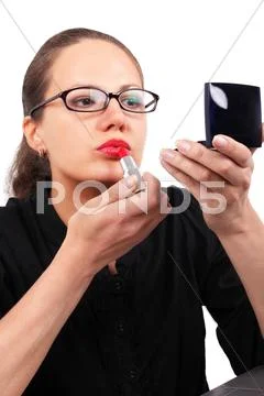 Businesswoman making make-up Stock Photos
