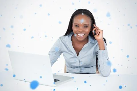 Businesswoman making a phone call while using a laptop イラスト素材