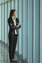 The businesswoman stand near the panoramic window Photo