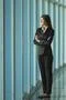 The businesswoman stand near the panoramic window Photo