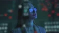 The businesswoman standing near the screen 4k or 4k+ Resolution