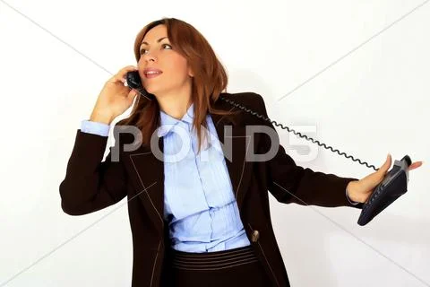 Businesswoman talking on the phone Stock Photos