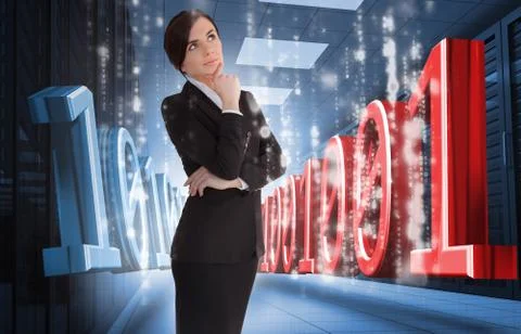 Businesswoman thinking of binary code in data center Stock Photos
