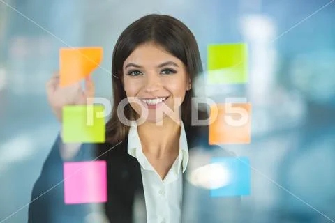 The businesswoman touch color stickers Stock Photos