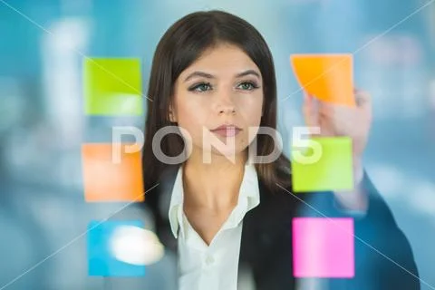 The businesswoman touch color stickers Stock Photos