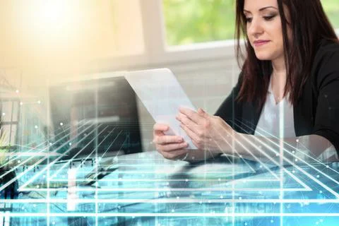 Businesswoman using digital tablet; multiple exposure Stock Photos