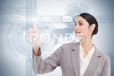 Businesswoman using futuristic interface Stock Photos
