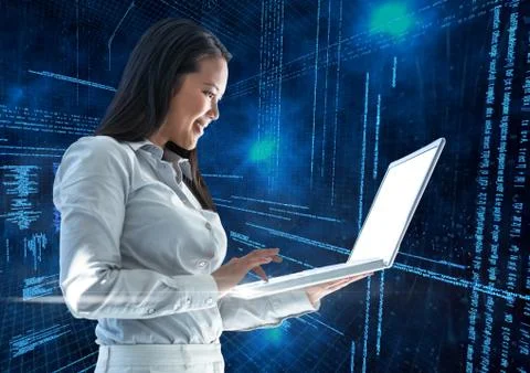 Businesswoman using laptop with binary codes in background Stock Photos