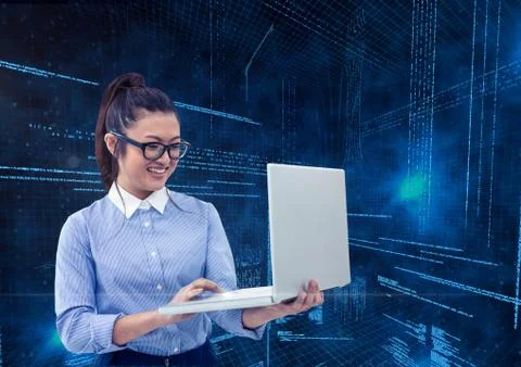 Businesswoman using laptop with binary codes in background Stock Photos