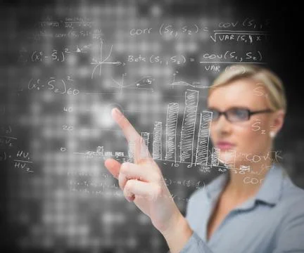 Businesswoman using patterns on touch screen Stock Photos