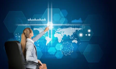 Businesswoman using virtual interface Stock Photos