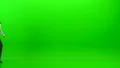 The businesswoman walking with a bag on the green background 4k or 4k+ Resolution