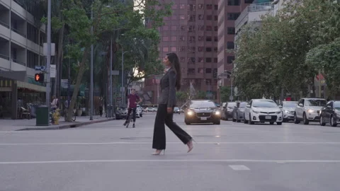 Businesswoman Walking In An Intersection Stock Footage 208741350