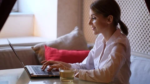 Businesswoman work on notebook computer in cafe Stock Footage 96174540