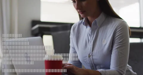 Businesswoman working on laptop with data processing animation over screen Stock-Footage 304015208
