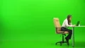 The businesswoman working with at the table and phones on the green background 4k or 4k+ Resolution