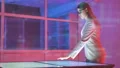 The businesswoman working with a virtual screen on the hologram background 4k or 4k+ Resolution