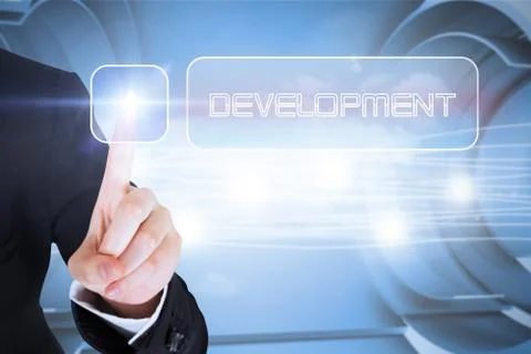 Businesswomans finger touching Development button Ilustração Stock