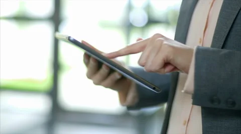 Businesswoman's hands using digital tablet in office Stock Footage 54989814