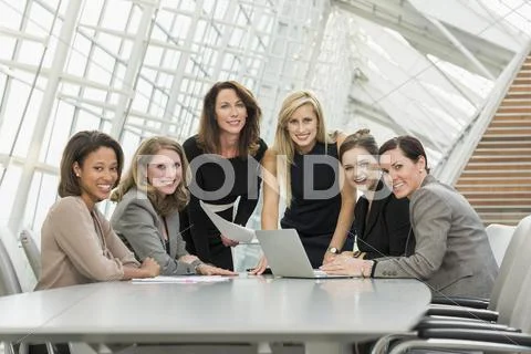 Businesswomen Posing In Conference Room