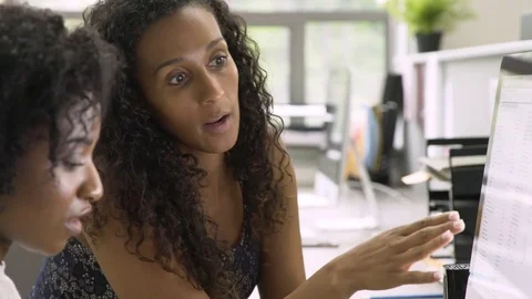Businesswomen using computer in office Stock Footage 80549807