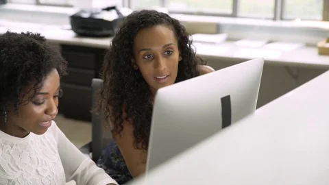 Businesswomen using computer in office Stock Footage 80550052