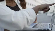 Businesswomen Working On Project And Typing On Laptop In City Stock Footage