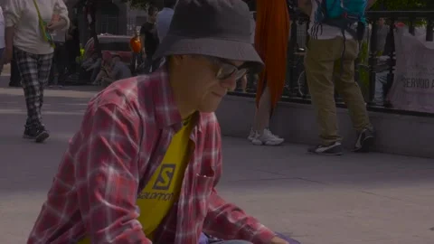 Busker in park Stock Footage 203906430