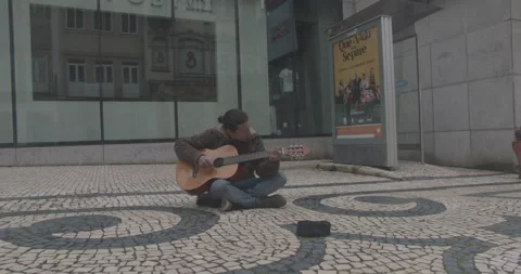 Busker Performs in Porto During Lockdown1 Stock Footage 149006340