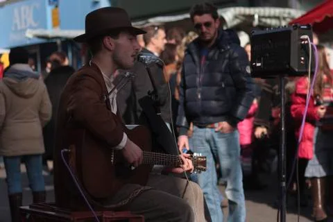 A Busker playing the Blues Stock Photos