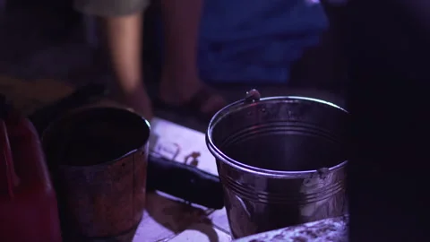 Busker prepares fire show Stock Footage 230704839