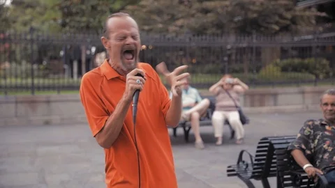 Busker singing in town square. New Orleans, Louisiana, USA Stock Footage 125533836