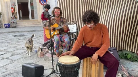 Buskers perform in Chefchaouen Stock Footage 303597650