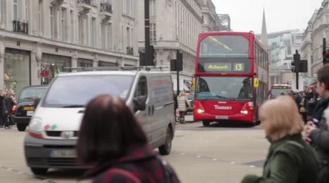 Buss in London passing by a square Stock Footage 58129548