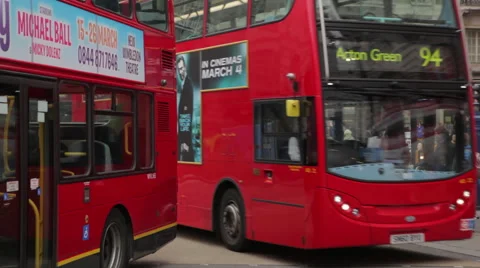 Buss in London passing by a square Stock Footage 58129552
