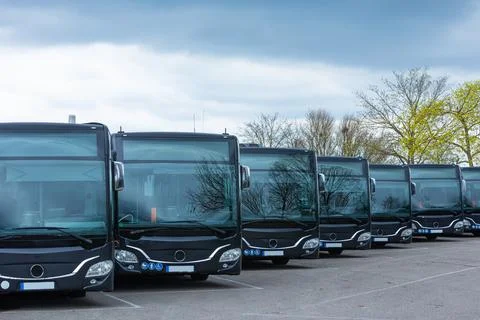Busses on a bus station lined up Stock Photos