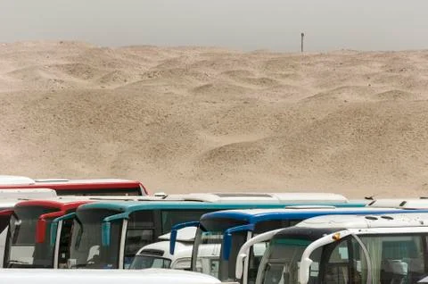 Busses in the desert. Stock Photos