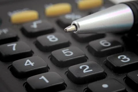 Bussines Calculation Pen Stock Photos