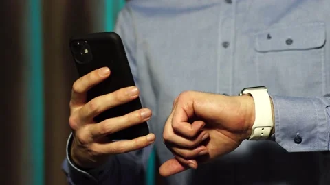 Bussines man looking smart watch Stock Footage 147751363