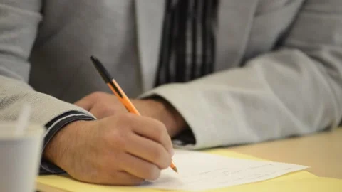 Bussines Man signing papers Stock Footage 147103367