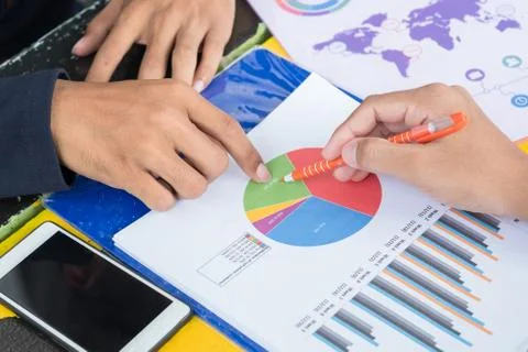 Bussiness man touch Pie chart Stock Photos